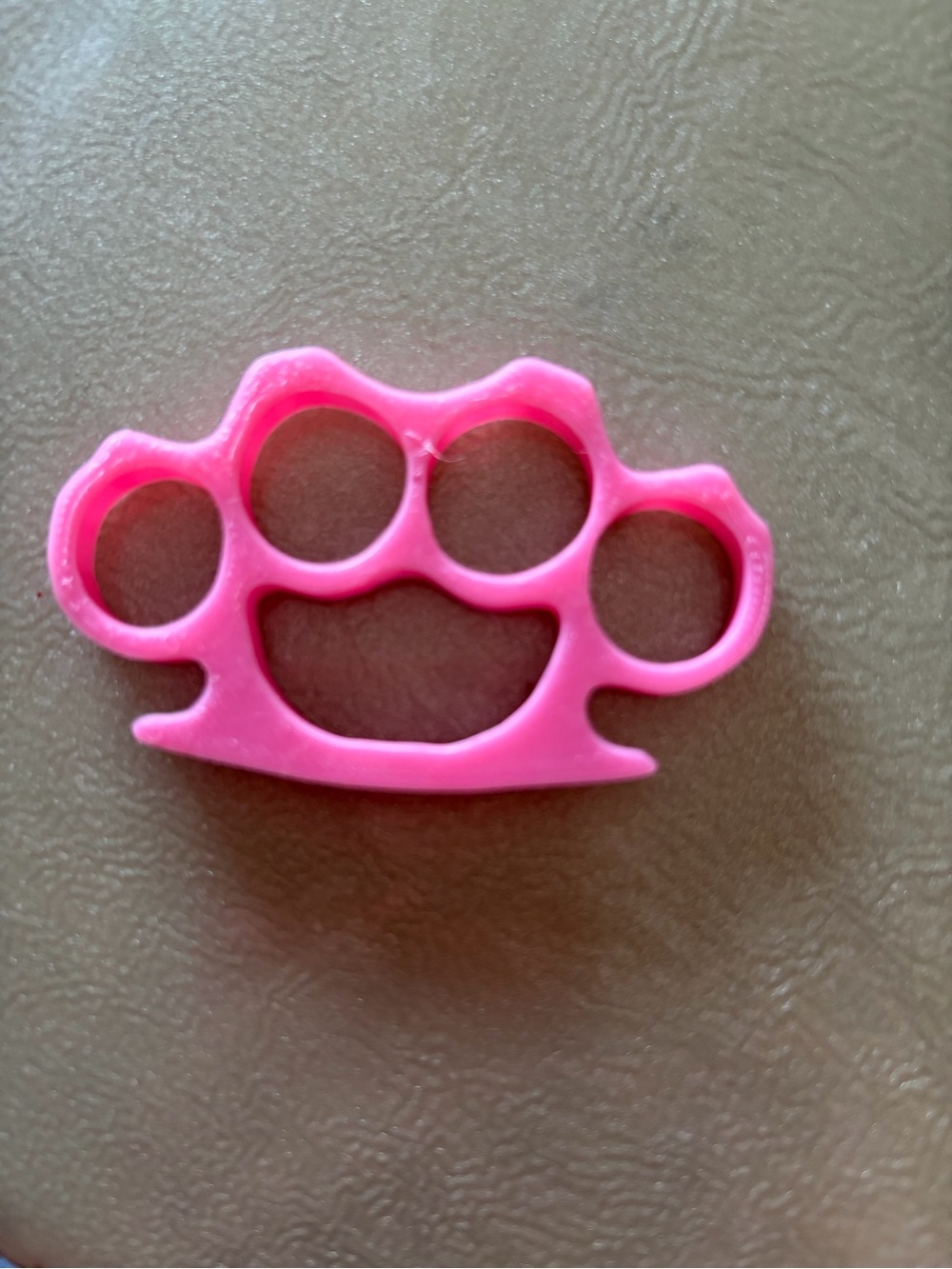 Pink Plastic Knuckle Duster Trinket